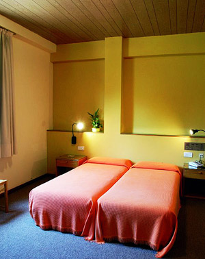 The hotel's simple, yet comfortable bedrooms