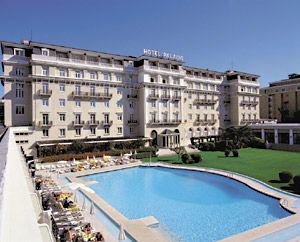 Hotel facade and pool.
